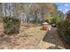 A spacious, partially shaded backyard, ideal for outdoor activities and relaxation at 11570 Dunhill Place Dr, Johns Creek, GA 30005