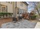 Charming backyard featuring a patio and deck, perfect for outdoor entertainment and relaxation at 11570 Dunhill Place Dr, Johns Creek, GA 30005