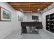 Finished basement showcasing exposed wood and includes a functional office space at 11570 Dunhill Place Dr, Johns Creek, GA 30005