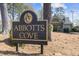 A close-up view of the Abbotts Cove neighborhood sign at 11570 Dunhill Place Dr, Johns Creek, GA 30005