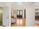 Grand two-story foyer with elegant hardwood floors, arched doorways and custom millwork, creating a welcoming entrance at 440 Old Homestead Trl, Johns Creek, GA 30097