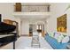 Grand foyer with soaring ceilings, hardwood floors, piano, and lots of light at 440 Old Homestead Trl, Johns Creek, GA 30097