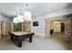 Spacious game room with a billiard table, recessed lights, and stone archways to other areas at 440 Old Homestead Trl, Johns Creek, GA 30097
