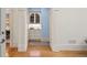 Hallway featuring detailed wood-work and leading to dining room and other parts of the house at 440 Old Homestead Trl, Johns Creek, GA 30097