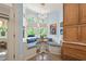 Sunny kitchen nook with custom built-in seating and plenty of natural light at 440 Old Homestead Trl, Johns Creek, GA 30097