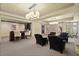 Entertaining lounge area with a bar, comfortable seating, and recessed lighting at 440 Old Homestead Trl, Johns Creek, GA 30097
