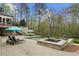 Relax at the gunite pool with adjacent hot tub and stone patio at 440 Old Homestead Trl, Johns Creek, GA 30097