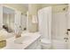 Bright bathroom featuring a shower and vanity at 8385 Sentinae Chase Dr, Roswell, GA 30076