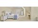 Spacious bedroom with a closet and desk at 8385 Sentinae Chase Dr, Roswell, GA 30076