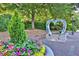 Picturesque neighborhood featuring a love-themed sculpture and colorful landscaping, perfect for a scenic stroll at 8385 Sentinae Chase Dr, Roswell, GA 30076