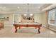 Game room with pool table at 8385 Sentinae Chase Dr, Roswell, GA 30076
