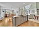 Open-concept kitchen with granite counters at 8385 Sentinae Chase Dr, Roswell, GA 30076