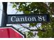 Close-up of the Canton Street street sign at 8385 Sentinae Chase Dr, Roswell, GA 30076