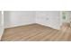 Bedroom featuring a large closet and light hardwood floors at 1 N Boundary Nw Pl, Atlanta, GA 30318