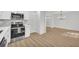 This remodeled kitchen has stainless appliances, white cabinets and lots of natural light at 1 N Boundary Nw Pl, Atlanta, GA 30318