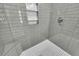 Close up of shower featuring subway tile and storage niche at 1 N Boundary Nw Pl, Atlanta, GA 30318