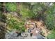 Aerial view showcasing the house, backyard, deck, outdoor seating and fire pit area at 201 Rippling Nw Dr, Marietta, GA 30064