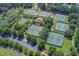 Beautiful tennis courts are nestled among mature trees with parking and a central clubhouse for recreation and community at 201 Rippling Nw Dr, Marietta, GA 30064
