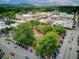 Bustling town square with shops, restaurants, trees, and a fountain, all nestled in a vibrant downtown setting at 201 Rippling Nw Dr, Marietta, GA 30064