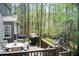 Beautiful back deck with outdoor seating overlooking the landscaped backyard at 201 Rippling Nw Dr, Marietta, GA 30064