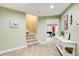 Basement area leading to stairs and bonus room with foosball table at 201 Rippling Nw Dr, Marietta, GA 30064