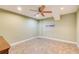 Finished basement featuring neutral paint, ceramic tile flooring, recessed lighting and framed artwork at 201 Rippling Nw Dr, Marietta, GA 30064