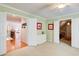 Spacious bedroom with double doors, leading to additional room and staircase at 201 Rippling Nw Dr, Marietta, GA 30064