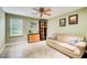 Sunlit bonus room with a neutral color scheme, tile floor and comfortable couch at 201 Rippling Nw Dr, Marietta, GA 30064
