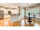 Inviting breakfast area with views of the kitchen and backyard at 201 Rippling Nw Dr, Marietta, GA 30064