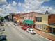 Charming street featuring a variety of shops and restaurants, enhanced by vibrant awnings and ample parking at 201 Rippling Nw Dr, Marietta, GA 30064