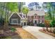 Beautiful two-story home with brick and siding exterior, showcasing a well-maintained lawn and inviting curb appeal at 201 Rippling Nw Dr, Marietta, GA 30064