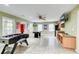 Finished basement area with games including foosball, ping pong, and a mini-kitchen for entertaining at 201 Rippling Nw Dr, Marietta, GA 30064