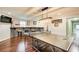 Finished basement featuring a ping pong table, hardwood floors, recessed lighting and a wet bar at 201 Rippling Nw Dr, Marietta, GA 30064
