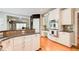 Kitchen features a breakfast bar, stainless steel oven, and stylish cabinets at 201 Rippling Nw Dr, Marietta, GA 30064