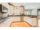 Bright kitchen features granite countertops, stainless steel appliances, and hardwood flooring at 201 Rippling Nw Dr, Marietta, GA 30064