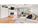 Cozy living room with a fireplace, built-in shelves, and coffered ceiling at 201 Rippling Nw Dr, Marietta, GA 30064
