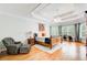 Spacious primary bedroom with tray ceiling, hardwood floors, and lots of natural light at 201 Rippling Nw Dr, Marietta, GA 30064