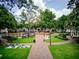Well-maintained park with walking paths, seating, and green spaces, perfect for community events at 201 Rippling Nw Dr, Marietta, GA 30064