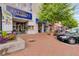Charming street view with local shops, brick sidewalks, and convenient parking at 201 Rippling Nw Dr, Marietta, GA 30064