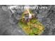 Aerial view of the property lines of a house surrounded by lush trees at 530 S Lost Lake Cv, Villa Rica, GA 30180