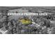Aerial view of property lines surrounded by mature trees and landscaping at 530 S Lost Lake Cv, Villa Rica, GA 30180