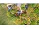 Aerial view of a house surrounded by lush trees and greenery at 530 S Lost Lake Cv, Villa Rica, GA 30180
