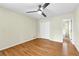 Bright bedroom with hardwood floors, ceiling fan, and closet at 530 S Lost Lake Cv, Villa Rica, GA 30180