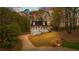 Charming home with a welcoming front porch and well-maintained lawn and driveway at 530 S Lost Lake Cv, Villa Rica, GA 30180
