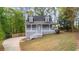 Charming home with a welcoming front porch and well-maintained lawn and driveway at 530 S Lost Lake Cv, Villa Rica, GA 30180