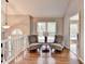 Inviting seating area with hardwood floors, great lighting, and comfortable seating at 6040 Carriage Dr, Cumming, GA 30028