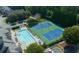 Aerial view of a pool and tennis courts at 12120 Dancliff Trce, Alpharetta, GA 30009