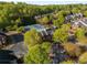 Aerial view of neighborhood and amenities including pool and tennis courts at 12120 Dancliff Trce, Alpharetta, GA 30009