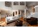 Spacious living room with high ceilings and elegant staircase at 12120 Dancliff Trce, Alpharetta, GA 30009