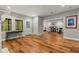 Spacious recreation room with beautiful hardwood floors and plenty of natural light at 12120 Dancliff Trce, Alpharetta, GA 30009